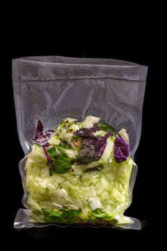 Packaged Salad Mix With Various Greens Inside