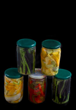 Pickled Vegetables in Jars on Black