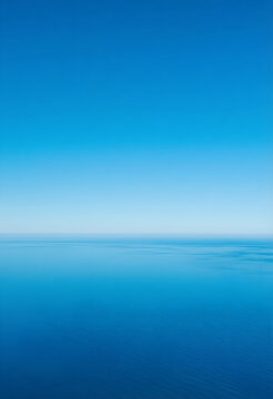 Travel and tourism concept, aerial view of deep blue ocean and clear sky horizon, peaceful atmosphere for vacation, summer holiday and freedom