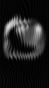 Wave texture on a black background with an abstract 3D ball shape in gray tones. Monochrome silver sphere seen through rippled vertical strips. Mobile format backdrop for fashion and art. 4K loop.