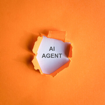 AI Agent - note behind a ripped orange paper hole
