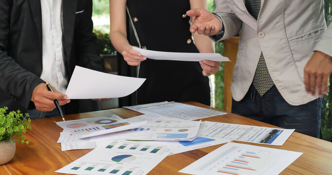 Business Partner using laptop online meeting team Partnership businessman, businesswoman talking together. Diversity Asian Business Partner online meeting trust teamwork. Asian Business team meeting.