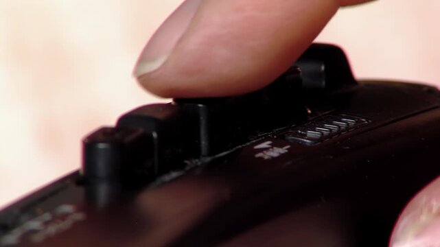 Close Up View Of Finger Pressing Play Button On Portable Cassette Player - 4K