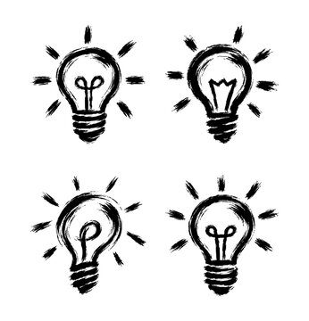 Set of Hand Drawn Glowing Light Bulbs Creative Ideas Icons
