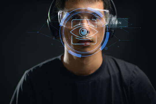 Futuristic Male Engineer Wearing Augmented Reality Glasses with Digital Interface
