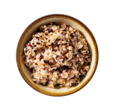 Steamed cooked multigrain rice in a ceramic rice bowl isolated on transparent background