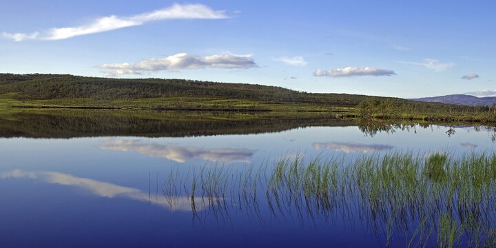 Clouds, calm lakeland landscape, late summer, Finnmark, Norway