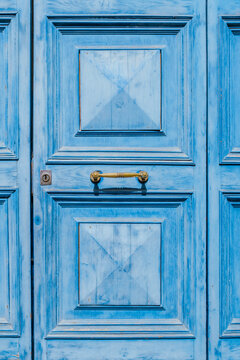 Classic Blue Wooden Entrance Door with Horizontal Brass Pull Handle