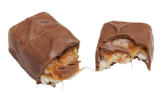 A chocolate bar with caramel, broken in half, isolated on a white background. A smooth milk chocolate coating surrounds a gooey caramel filling