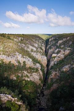 Storm's river flowing through steep rocky gorge south africa