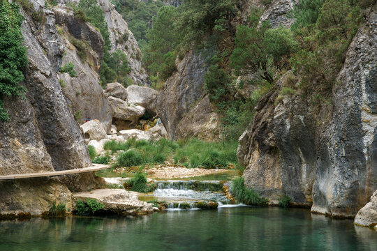 Wooden walkways in the natural setting of the Parrizal de Beceite gorge. Beceite, Teruel, Aragon, Spain.