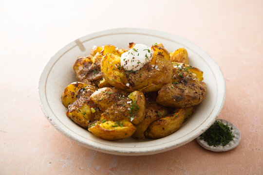 Smashed baked potatoes with sea salt and herbs