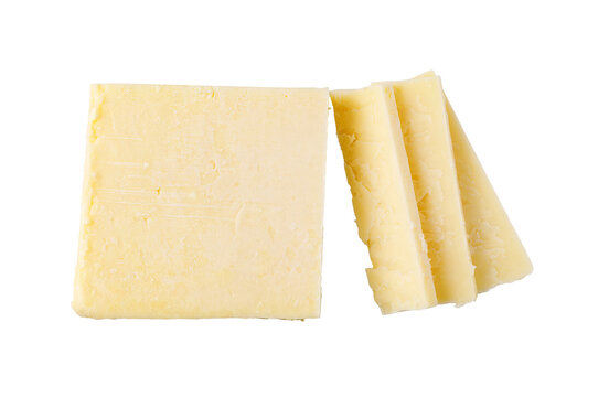 Cheddar cheese block and slices on transparent background