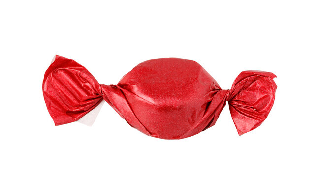 Red wrapped candy with twisted ends isolated on transparent background