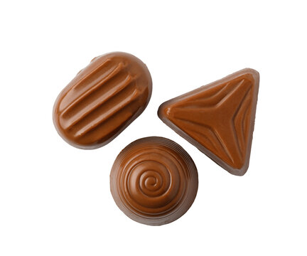 Assorted milk chocolate pralines isolated on transparent background