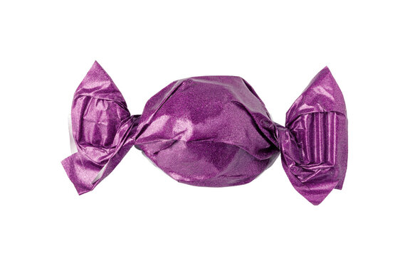 Purple foil-wrapped candy with twisted ends on transparent background