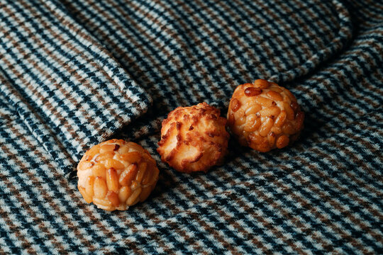 three Catalan panellets on checked fabric