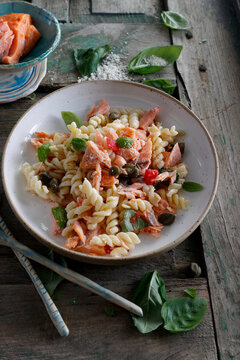 Fusilli pasta with roasted salmon and capers