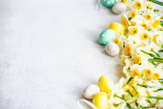 Easter decorations with daffodils and colorful patterned eggs