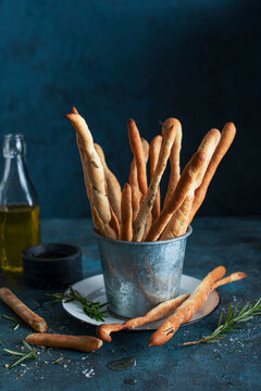 Breadsticks seasoned with rosemary, olive oil