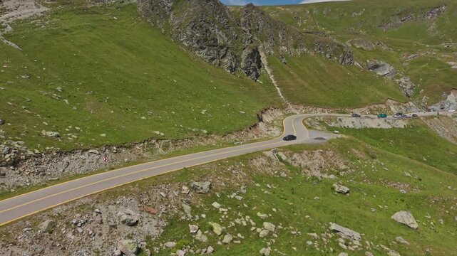 Transalpina Road Curving Around Rocky Ridge
