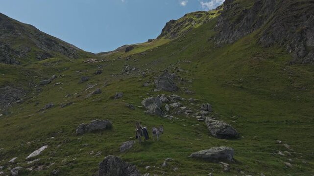 Shadowed Boulders Below Jagged Mountain Crest
