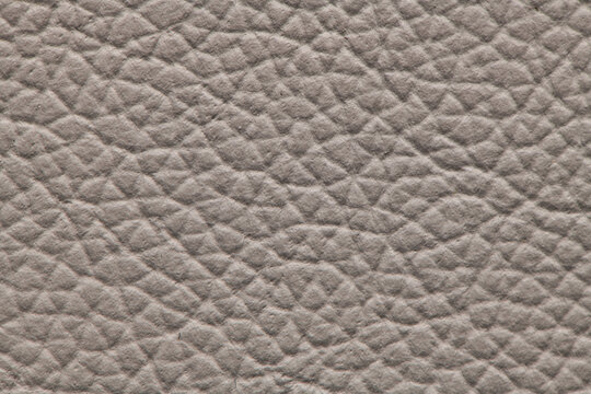 Light grey pebbled leather texture surface background