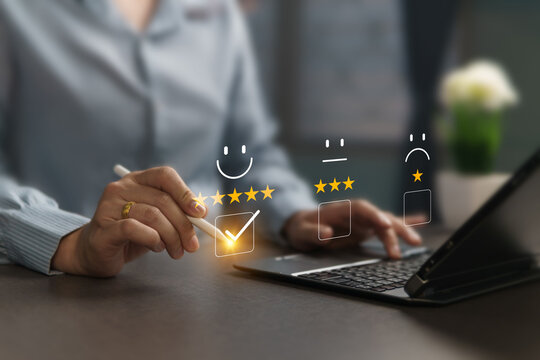 A 5-star rating indicates satisfaction. Customers use a laptop to complete a post-service questionnaire, interacting with virtual holographic icons displayed on the screen.