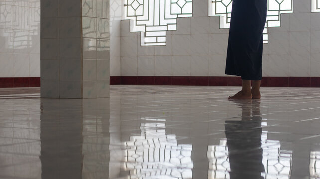 Muslim Man Praying in Mosque