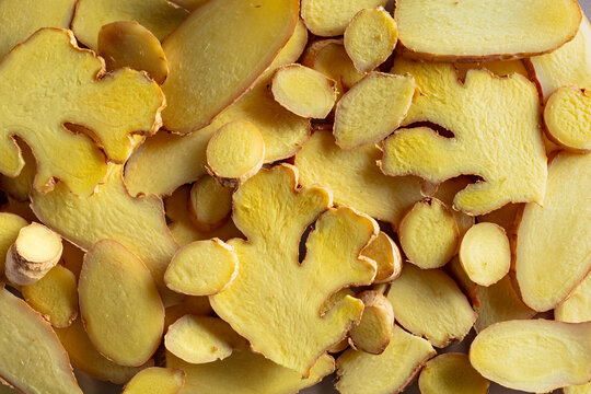 Close-up of fresh ginger slices.