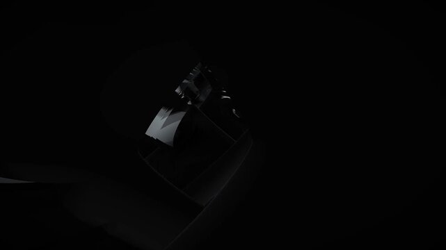 Dark abstract geometric shapes in a sculptural composition