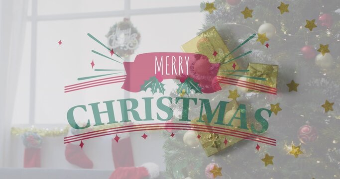 Pink banner reading MERRY CHRISTMAS overlaying decorated tree with gold stars and gifts near window