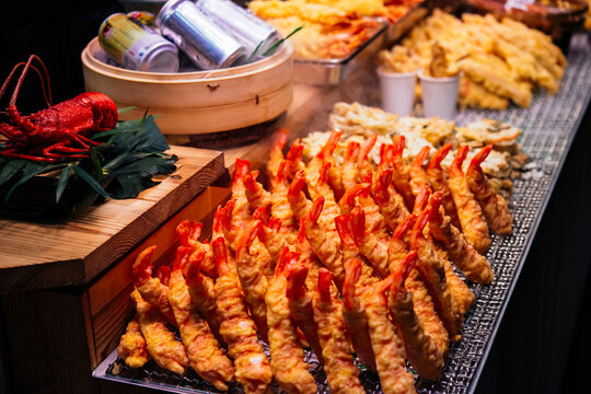 Different kinds of seafood on sale at the Kuromon Ichiba market in Osaka, Japan.