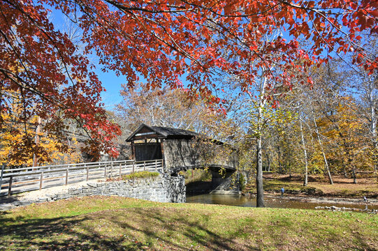 Humpback Bridge covered bridge Covington Virginia in autumn fall foliage 