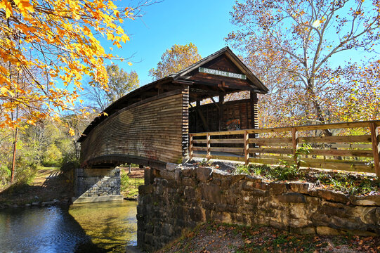 Humpback Bridge covered bridge Covington Virginia in autumn fall foliage 