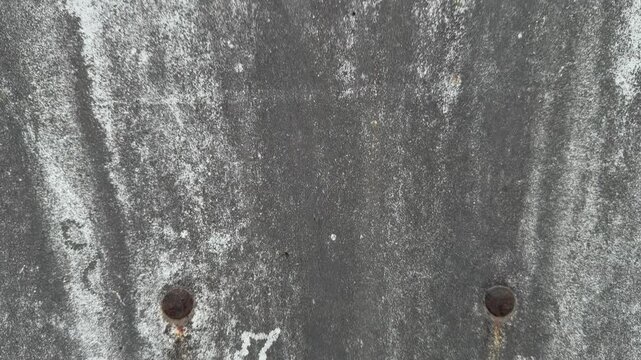 Old weather-beaten antenna dish texture with dripping stains and rusted rivets, rough industrial pattern background
