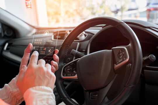 Hand of a mechanic holding the tablet for maintenance checklist vehicle Car service and checking concept, Software for manager check to repair, technology checkup automotive