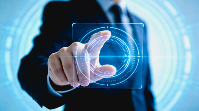 A professional businessman in a suit touches a glowing futuristic digital holographic interface for tech interaction.