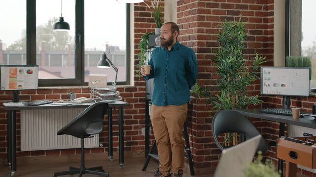 Harassment, touching and coworkers during an office water break as a woman makes inappropriate physical contact with a male colleague, for workplace boundaries, employee conduct and misconduct.