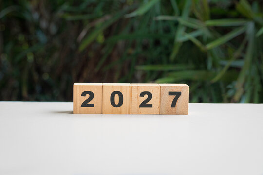 2027 on wood blocks. New year concept.