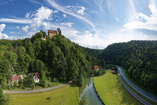 Right St 2191, river Wiesent with hydroelectric power plant power station Rabeneck mill, castle Rabeneck, former high medieval noble castle at the Wiesent valley, near Oberrailsfeld, district of Waischenfeld, Franconian Switzerland, Upper Franconia, Bavaria, Germany