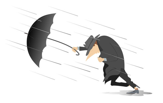 Man with umbrella walks through the wind and rain