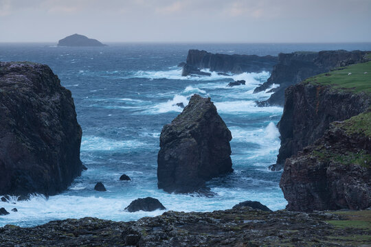 Dramatic cliffs and stormy sea at Eshaness, Shetland, Scotland