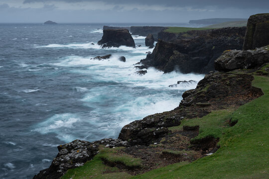 Dramatic cliffs and stormy sea at Eshaness, Shetland, Scotland