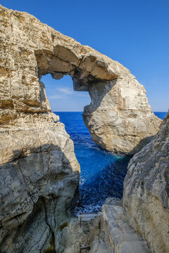 Wied il-Mielaħ Window Natural Rock Arch Framing the Sea on the Coastal Cliff Edge, Gozo, Malta