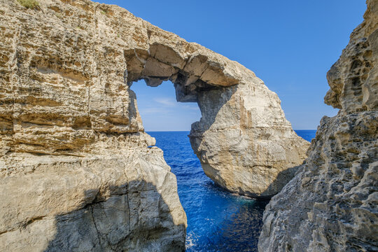 Wied il-Mielah Window Natural Rock Arch Overlooking Blue Sea, Gozo
