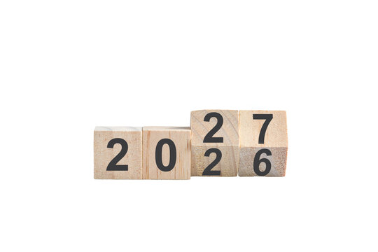 Wooden Blocks Showing Transition to Year 2027. Isolated on transparent background.