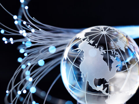 Globe and fibre optics, black background