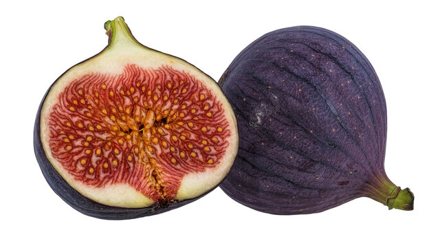 Fresh ripe purple fig fruit cut in half showing red pulp and yellow seeds