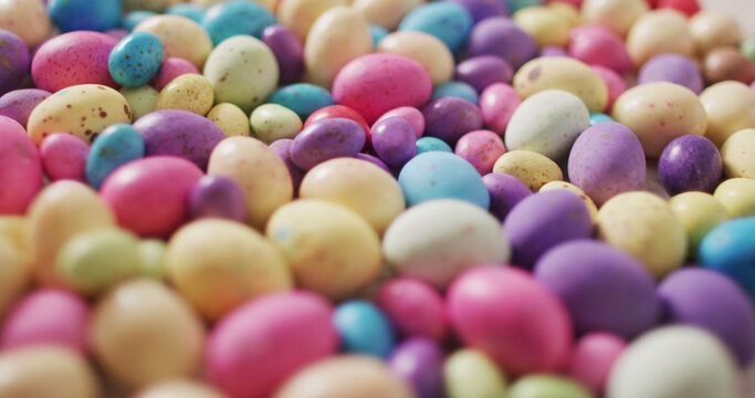 Image of decorated colorful easter eggs on a wooden surface